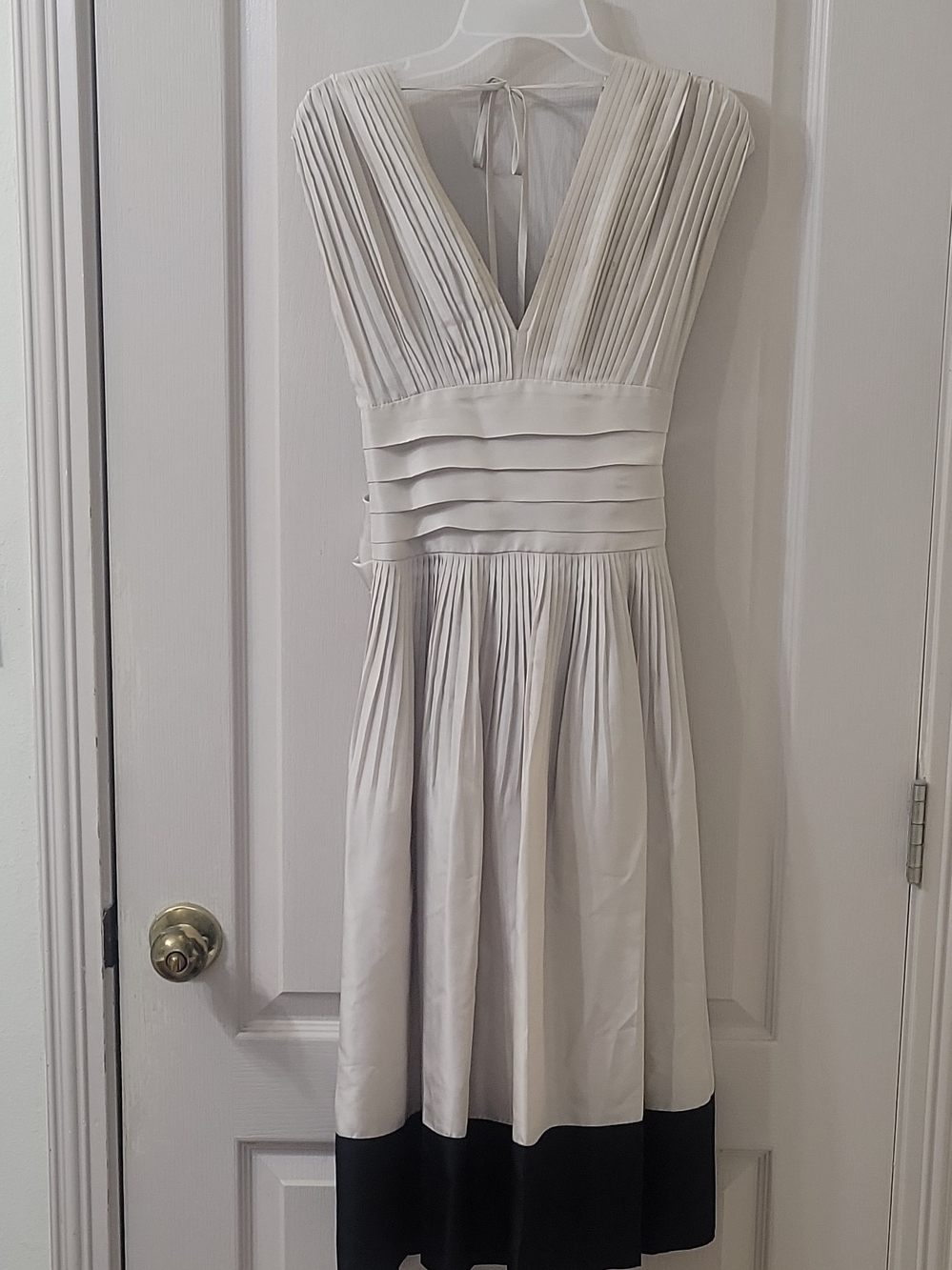 BCBGMaxAzria Ivory V-Neck Pleated Midi Dress with Black Hem